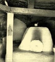 63. Chimneyless kitchen of a cottage built on a log foundation