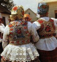 XII. Women and girls in festive costume 